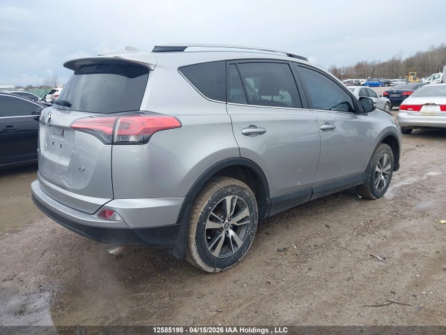 12585198 :رقم المزاد ، 2T3ZFREV0JW460254 vin ، 2018 Toyota Rav4 مزاد بيع