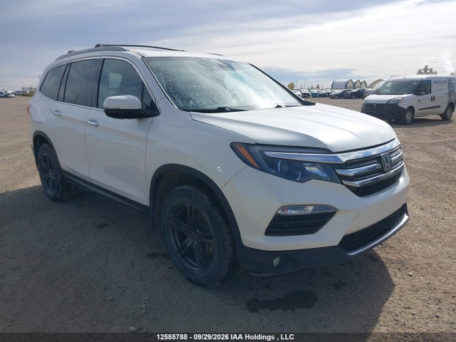 2017 Honda Pilot Touring მანქანა იყიდება აუქციონზე, vin: 5FNYF6H93HB500710, აუქციონის ნომერი: 12585788