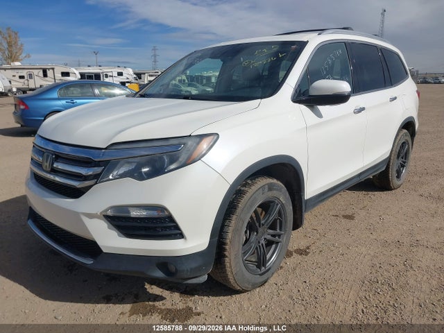 12585788 :رقم المزاد ، 5FNYF6H93HB500710 vin ، 2017 Honda Pilot Touring مزاد بيع