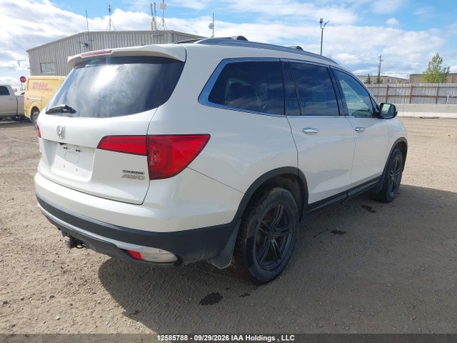 12585788 :رقم المزاد ، 5FNYF6H93HB500710 vin ، 2017 Honda Pilot Touring مزاد بيع