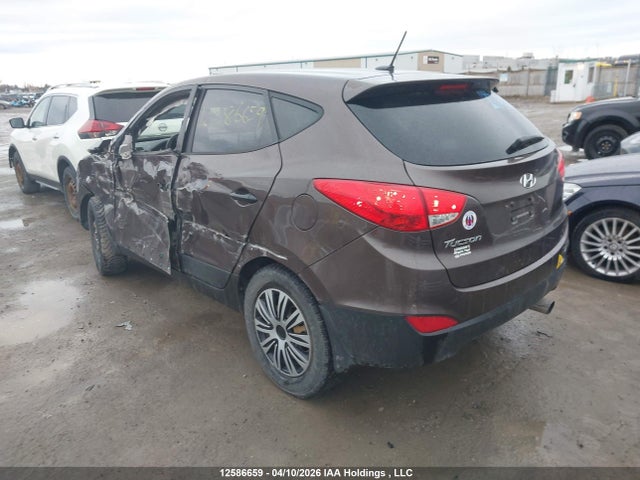 KM8JT3AF7EU855564 Hyundai Tucson Gl