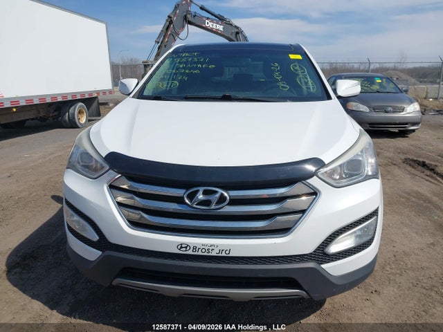 12587371 :رقم المزاد ، 5XYZUDLA8DG067646 vin ، 2013 Hyundai Santa Fe مزاد بيع