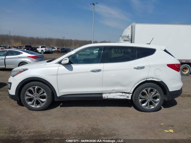 12587371 :رقم المزاد ، 5XYZUDLA8DG067646 vin ، 2013 Hyundai Santa Fe مزاد بيع