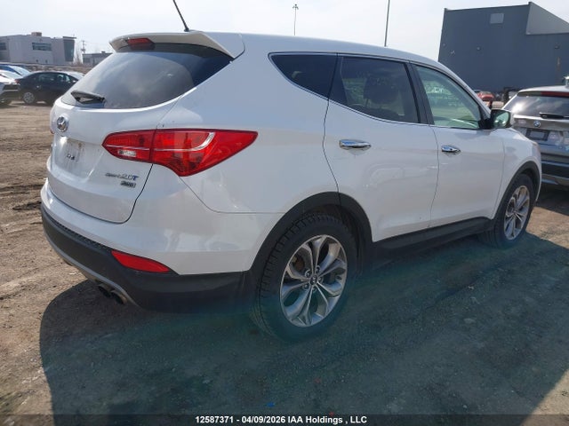 12587371 :رقم المزاد ، 5XYZUDLA8DG067646 vin ، 2013 Hyundai Santa Fe مزاد بيع