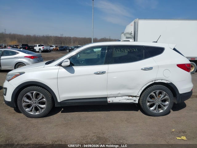 12587371 :رقم المزاد ، 5XYZUDLA8DG067646 vin ، 2013 Hyundai Santa Fe مزاد بيع