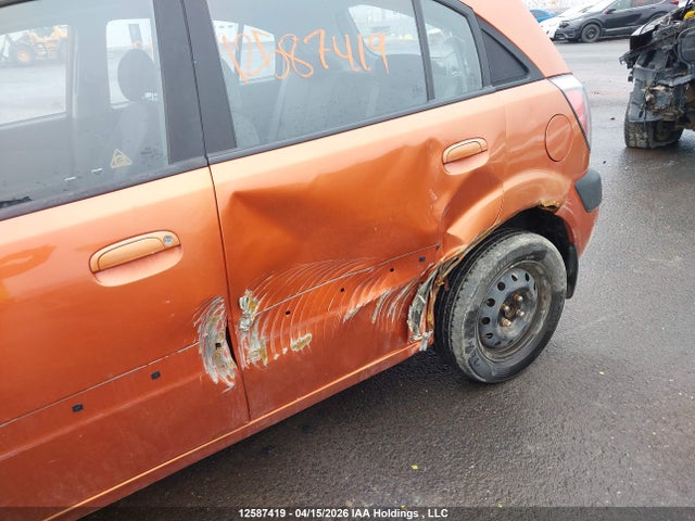 12587419 :رقم المزاد ، KNADE243696492124 vin ، 2009 Kia Rio 5 Sx مزاد بيع