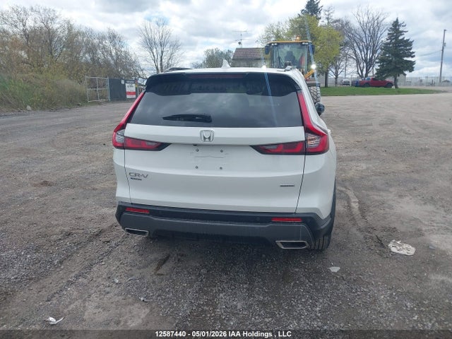 Auction sale of the 2025 Honda Cr-v Touring Hybrid, vin: 2HKRS6H97SH225268, lot number: 12587440