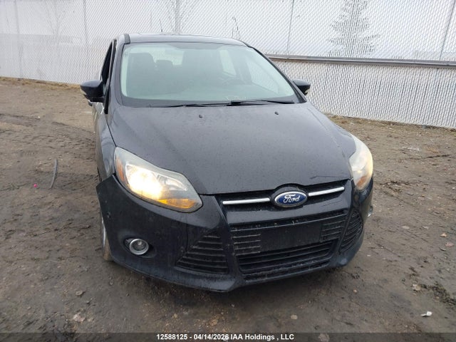 12588125 :رقم المزاد ، 1FAHP3N27CL438372 vin ، 2012 Ford Focus Titanium مزاد بيع