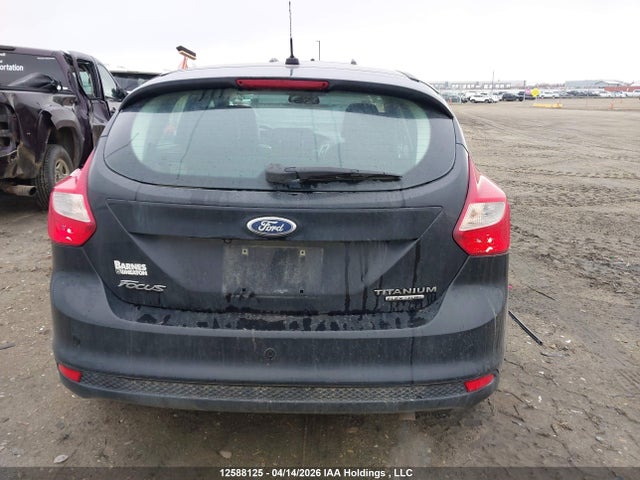 12588125 :رقم المزاد ، 1FAHP3N27CL438372 vin ، 2012 Ford Focus Titanium مزاد بيع