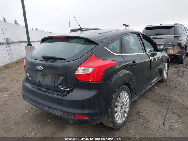 12588125 :رقم المزاد ، 1FAHP3N27CL438372 vin ، 2012 Ford Focus Titanium مزاد بيع