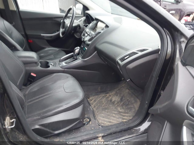 12588125 :رقم المزاد ، 1FAHP3N27CL438372 vin ، 2012 Ford Focus Titanium مزاد بيع