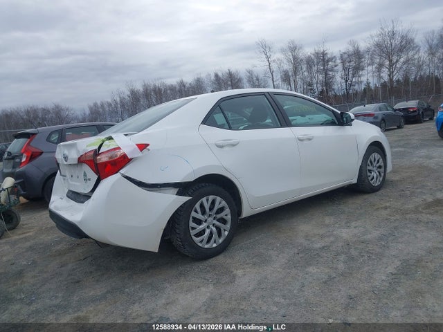 2T1BURHE6JC063385 Toyota COROLLA LE