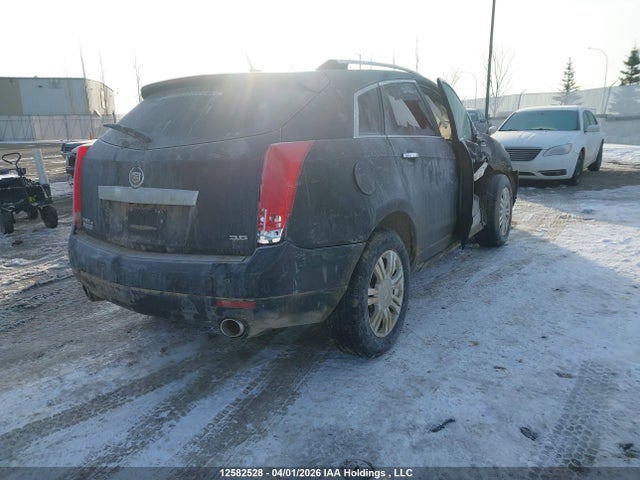 2014 Cadillac Srx Luxury მანქანა იყიდება აუქციონზე, vin: 3GYFNEE33ES606818, აუქციონის ნომერი: 12582528