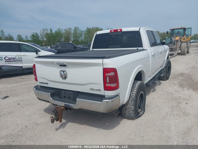 12589818 :رقم المزاد ، 3C6UR5FL1MG703380 vin ، 2021 Ram 2500 Laramie مزاد بيع
