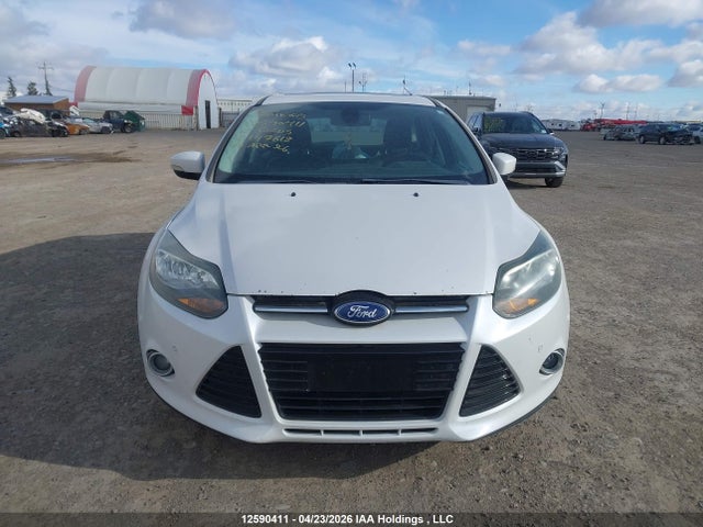 Продажа на аукционе авто 2012 Ford Focus Titanium, vin: 1FAHP3N21CL142618, номер лота: 12590411