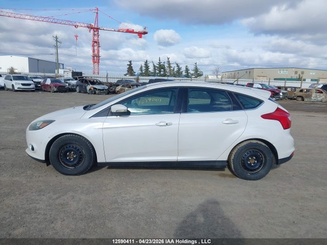 Продажа на аукционе авто 2012 Ford Focus Titanium, vin: 1FAHP3N21CL142618, номер лота: 12590411