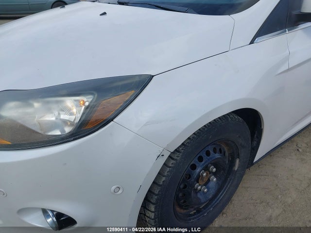 Продажа на аукционе авто 2012 Ford Focus Titanium, vin: 1FAHP3N21CL142618, номер лота: 12590411
