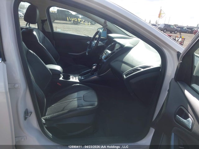 Продажа на аукционе авто 2012 Ford Focus Titanium, vin: 1FAHP3N21CL142618, номер лота: 12590411