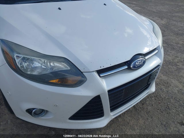Продажа на аукционе авто 2012 Ford Focus Titanium, vin: 1FAHP3N21CL142618, номер лота: 12590411