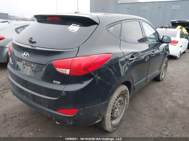 KM8JTCAF1EU893257 Hyundai TUCSON GLS