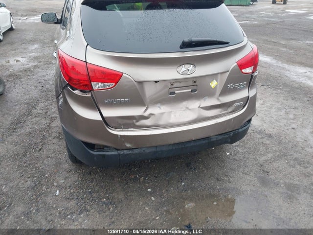 12591710 :رقم المزاد ، KM8JUCAC7AU025261 vin ، 2010 Hyundai Tucson Gls/limited مزاد بيع