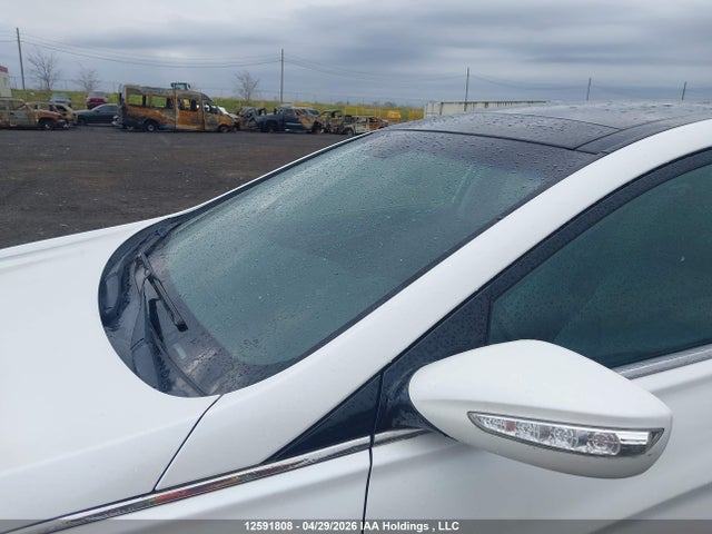 2014 Hyundai Sonata Hybrid Hybrid მანქანა იყიდება აუქციონზე, vin: KMHEC4A42EA115573, აუქციონის ნომერი: 12591808