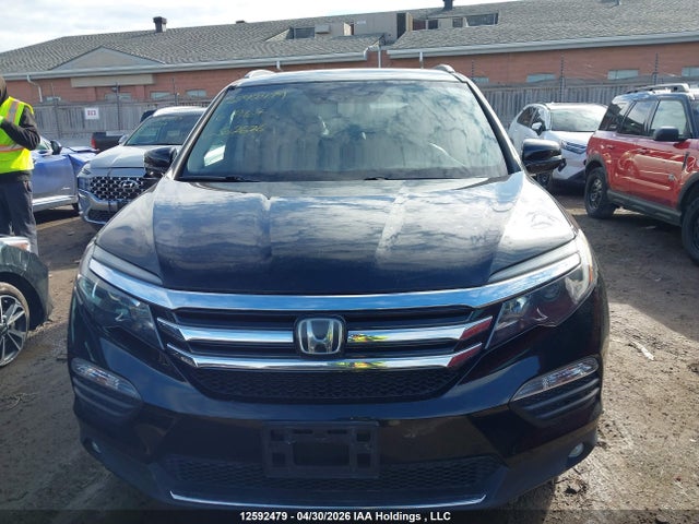 5FNYF6H94GB502626 Honda Pilot Touring