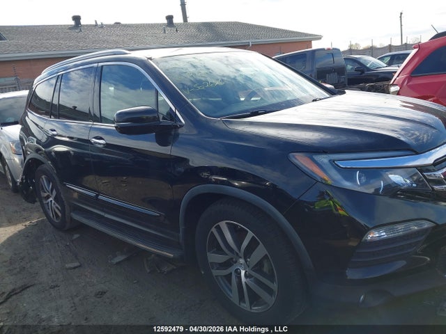 5FNYF6H94GB502626 Honda Pilot Touring