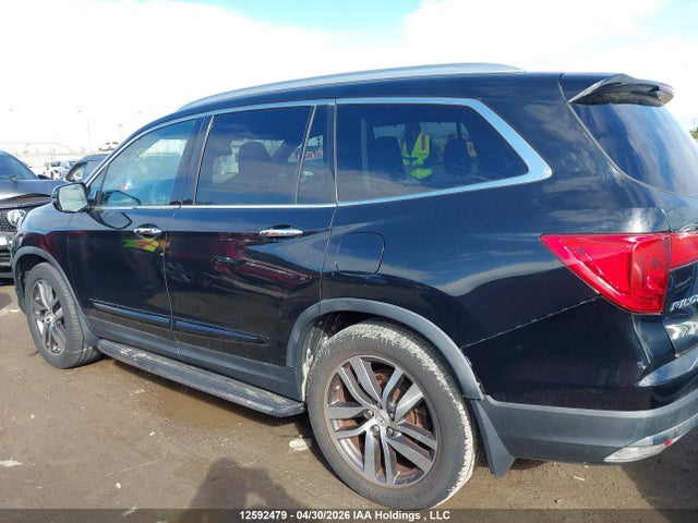 5FNYF6H94GB502626 Honda Pilot Touring
