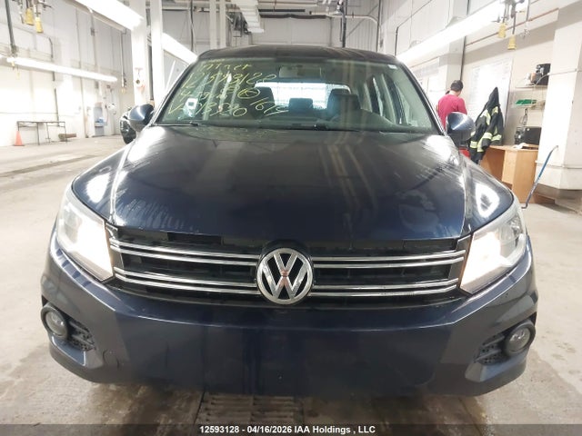 WVGJV3AXXEW513520 Volkswagen Tiguan
