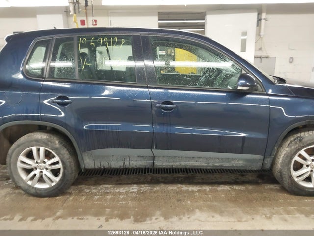WVGJV3AXXEW513520 Volkswagen Tiguan