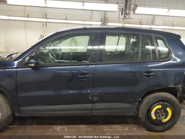 WVGJV3AXXEW513520 Volkswagen Tiguan