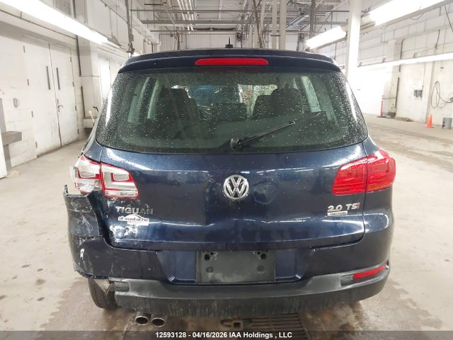 WVGJV3AXXEW513520 Volkswagen Tiguan