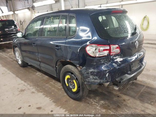 WVGJV3AXXEW513520 Volkswagen Tiguan
