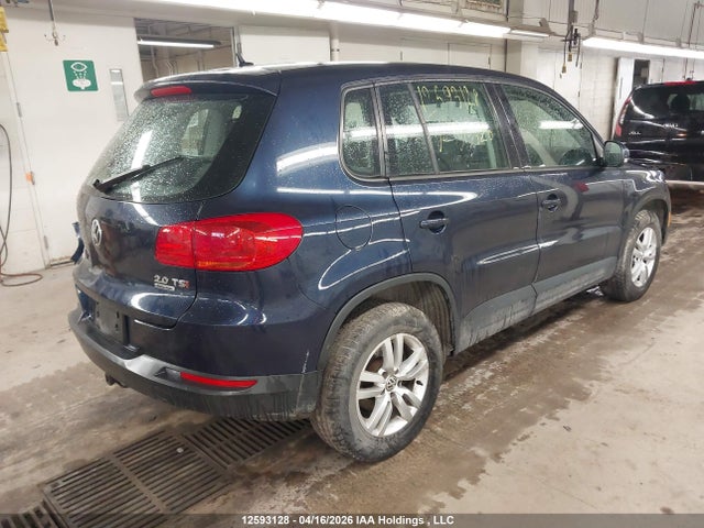 WVGJV3AXXEW513520 Volkswagen Tiguan
