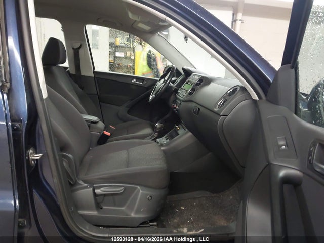 WVGJV3AXXEW513520 Volkswagen Tiguan