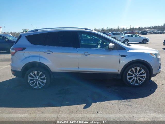 Продажа на аукционе авто 2017 Ford Escape Titanium, vin: 1FMCU9J95HUB06785, номер лота: 12594136