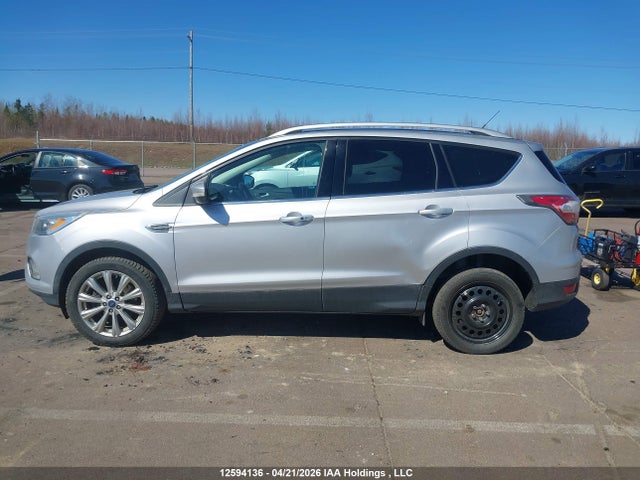 Продажа на аукционе авто 2017 Ford Escape Titanium, vin: 1FMCU9J95HUB06785, номер лота: 12594136
