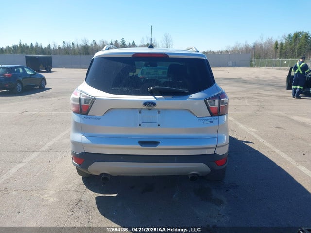 Продажа на аукционе авто 2017 Ford Escape Titanium, vin: 1FMCU9J95HUB06785, номер лота: 12594136
