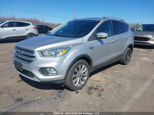 Продажа на аукционе авто 2017 Ford Escape Titanium, vin: 1FMCU9J95HUB06785, номер лота: 12594136