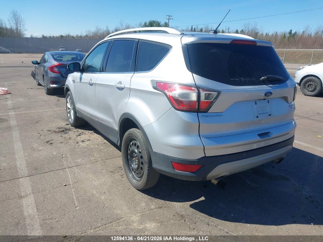 Продажа на аукционе авто 2017 Ford Escape Titanium, vin: 1FMCU9J95HUB06785, номер лота: 12594136