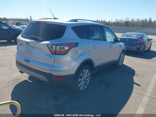 Продажа на аукционе авто 2017 Ford Escape Titanium, vin: 1FMCU9J95HUB06785, номер лота: 12594136