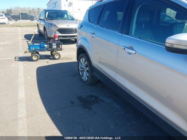 Продажа на аукционе авто 2017 Ford Escape Titanium, vin: 1FMCU9J95HUB06785, номер лота: 12594136