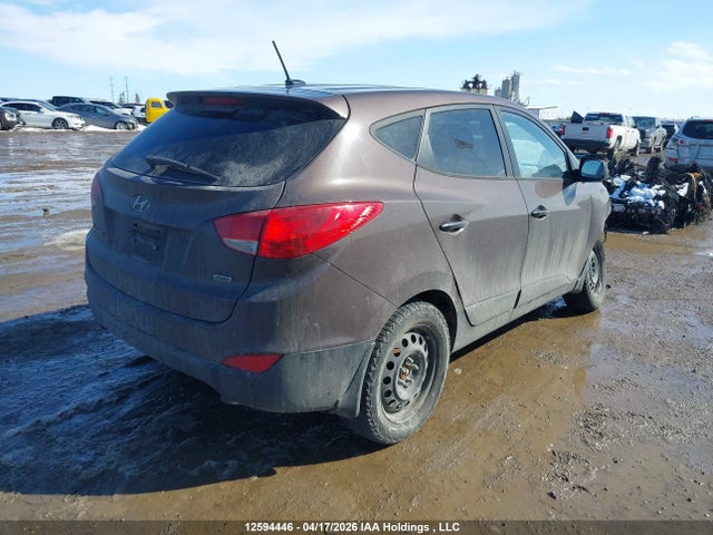 KM8JTCAF1EU833365 Hyundai Tucson Gl