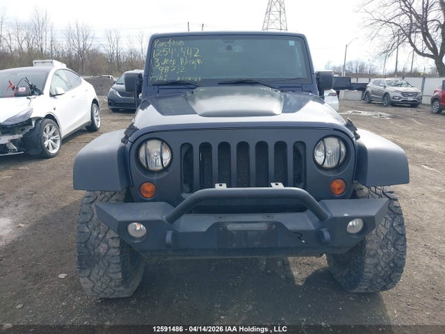 12591486 :رقم المزاد ، 1C4BJWEGXDL598732 vin ، 2013 Jeep Wrangler Unlimited Sahara مزاد بيع