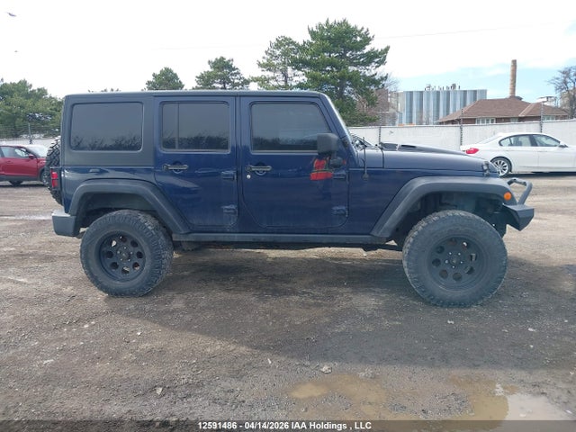 12591486 :رقم المزاد ، 1C4BJWEGXDL598732 vin ، 2013 Jeep Wrangler Unlimited Sahara مزاد بيع