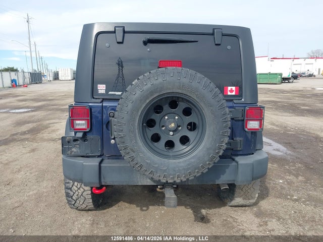 12591486 :رقم المزاد ، 1C4BJWEGXDL598732 vin ، 2013 Jeep Wrangler Unlimited Sahara مزاد بيع