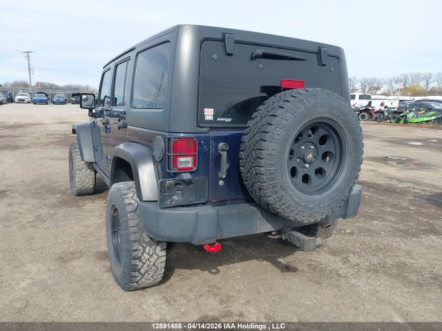 12591486 :رقم المزاد ، 1C4BJWEGXDL598732 vin ، 2013 Jeep Wrangler Unlimited Sahara مزاد بيع