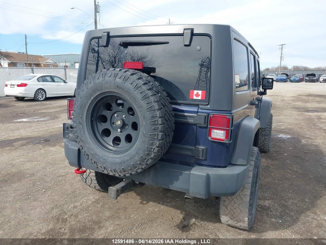12591486 :رقم المزاد ، 1C4BJWEGXDL598732 vin ، 2013 Jeep Wrangler Unlimited Sahara مزاد بيع