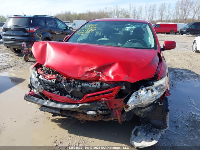 12594632 :رقم المزاد ، 2T1BU4EE5CC853349 vin ، 2012 Toyota Corolla S/le مزاد بيع
